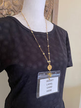 Load image into Gallery viewer, Gold tone Best Life Ever Lanyard style necklace with daisy paper clip chain and bow charm