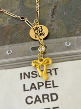 Load image into Gallery viewer, Gold tone Best Life Ever Lanyard style necklace with rhinestone paper clip chain and bow charm
