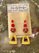 Load image into Gallery viewer, Red and Gold Czech Glass earrings with brass charms
