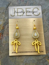 Load image into Gallery viewer, Silver and gold Czech glass teardrop earrings with bow charms
