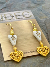 Load image into Gallery viewer, White Czech glass heart earrings with small heart charms
