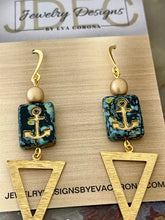 Load image into Gallery viewer, Czech Glass anchor earrings with brass charms
